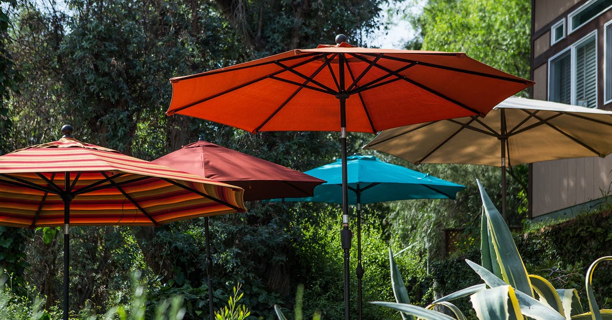 Wood Patio Umbrellas Or Metal Patio Umbrellas: Discover the Perfect Outdoor Shade Solution